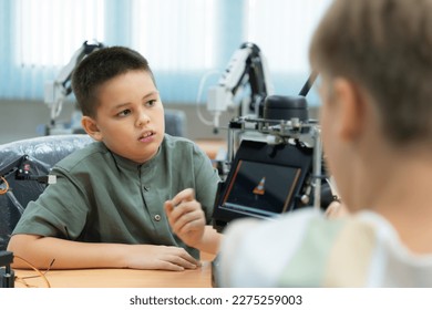 Children using the hand robot technology, Students are studying technology, which is one of the STEM courses.