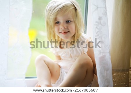 Similar – happy child girl playing at home in cozy weekend morning