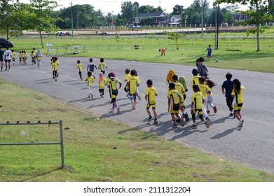 Children Are Walking In The Field Of January 23, 2022, Yogyakarta, Indonesiabangunan Stadion Sultan Agung Di Bantul Untuk Bermain Sepakbola Dan Olah Raga