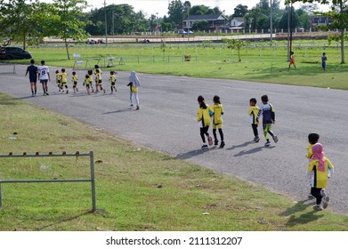 Children Are Walking In The Field Of January 23, 2022, Yogyakarta, Indonesiabangunan Stadion Sultan Agung Di Bantul Untuk Bermain Sepakbola Dan Olah Raga