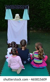 Children Watching Puppet Show