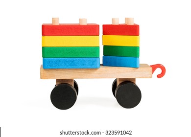 Children Wooden Wagon On Wheels With Threaded Rods Which Are Rectangular And Triangular Blocks A Side View Isolated On White Background