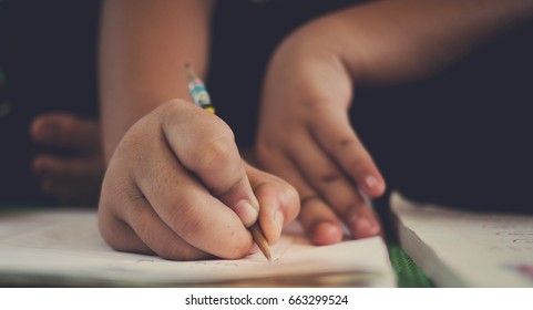 children writing paper