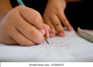 Children Writing Paper
