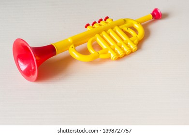 yellow toy trumpet