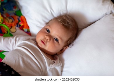 Children.Baby. Cute baby  girl lies down and rests