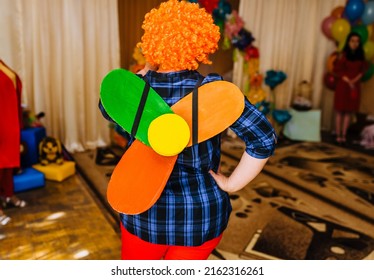 A Children's Animator In A Carlson Costume With A Propeller Indoors Entertains Children In A Kindergarten.