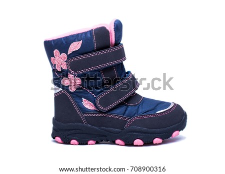 Children's autumn or winter fashion boots isolated on white background. Baby shoes