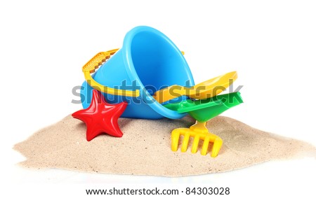 children's beach toys and sand isolated on white