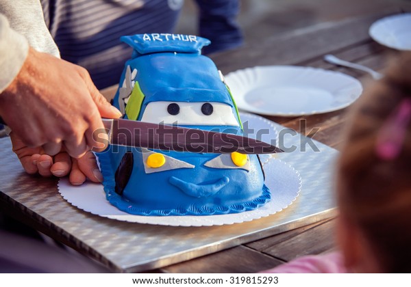 children\'s birthday car cake\
cutting