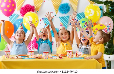 children's birthday. happy kids with cake and ballons