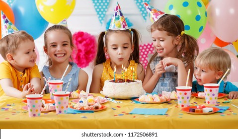 children's birthday. happy kids with cake and ballons