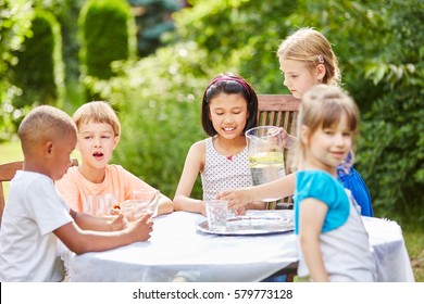 Childrens Birthday Party With Kids Drinking Water In Summer