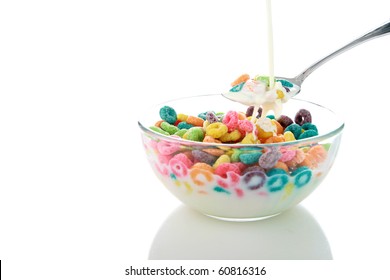 Childrens Breakfast Cereal Loops With Milk. Isolated On White