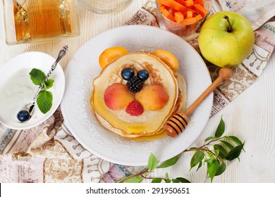 Children's Breakfast Lunch Pancakes Smiling Face Of The Sun Lion Strawberry Blueberry And Apricot, Cute Food, Honey, Creative Idea Dinner Kid Breakfast  Pancake Fun Breakfast 