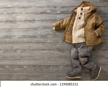 Childrens Clothing, Shoes (knit Sweater, Hooded Canvas Jacket, Jeans, Suede Boots). Outfit For Little Boy. Winter, Autumn Collection. Fashion, Shopping Concept. Template For Online Store. Flat Lay