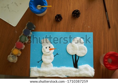 children's DIY creativity cotton wool snowman top view                               