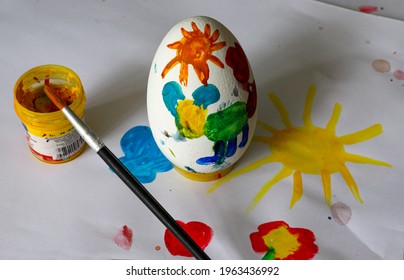  Children's drawing of Easter. Large Easter eggs were painted by small children, brushes and paints. The concept of children's creativity. - Powered by Shutterstock