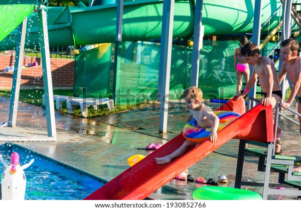 Children\'s entertainment in the\
pool, a fun descent from the slide into the pool with water.\
new