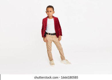 Children's Fashion, Style, Beauty And Ethnicity Concept. Isolated Full Length Shot Of Confident Serious African American Schoolboy Posing Against Copy Space Background, Dressed In Trendy Clothes