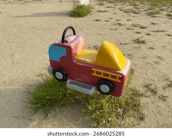 Children's fire engine ride installed in the park
