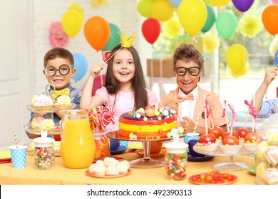 Children's Funny Birthday Party In Decorated Room