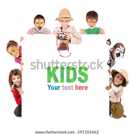 Children's group in safari clothes and animal face-paint over a white board