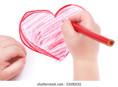 Childrens hand with pencil draws the heart, isolated