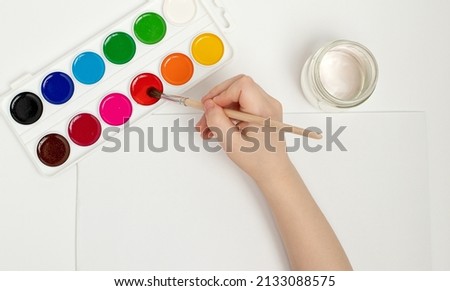 Similar – Image, Stock Photo Child painting with watercolor