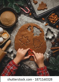 Children's Hands Cut Shapes And Make Cookies. Making Christmas Cookies. View From Above.