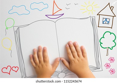 Children's Hands On The Book. Fantasy Child