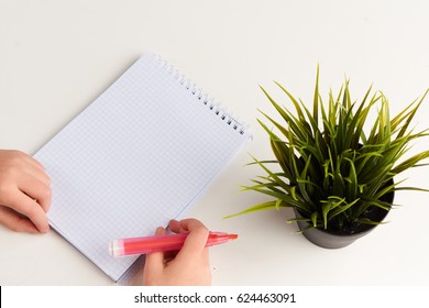 Children's hands write                               