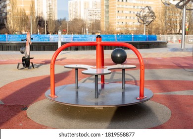 children's little carousel on a playground without children