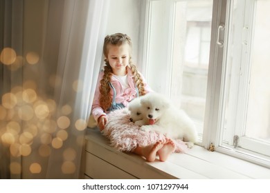 Children's love of the dog - Shutterstock ID 1071297944