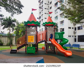A children's playground in a residential neighbourhood. Playground designed like a castle for children.