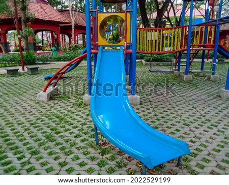 a children's playground slide, at the lantern park in Klaten, Indonesia.