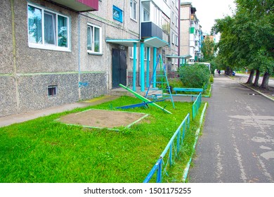 Children's Playground In A Very Small Courtyard Of An Apartment Building. Russia.