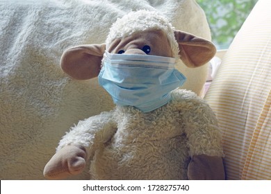 A Childrens Plush Stuffed Animal Toy Wearing A Face Mask During The COVID-19 Pandemic