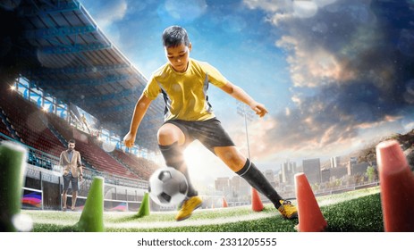 Children's professional soccer players workout with coach on the grand stadium - Powered by Shutterstock