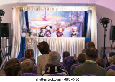 Children's Puppet Theater. Spectators, Children's Holiday. Dolls