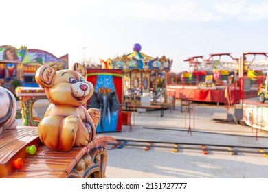 Children's rides and carousels are closed and empty. Joy and entertainment for children. Bright carousels and carriages for transporting children are empty. Carousels are waiting for children.