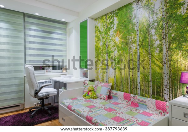 Children's room with wallpaper mural photo