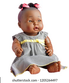 Children's toy - a doll. Black big doll isolated on white background.                          