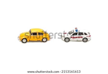 Children's toy machine yellow beetle and ambulance on white background insulation