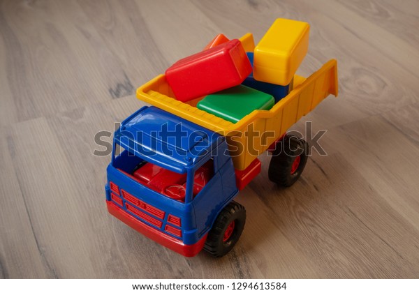 Children\'s toy. Truck\
with multicolored\
cubes.