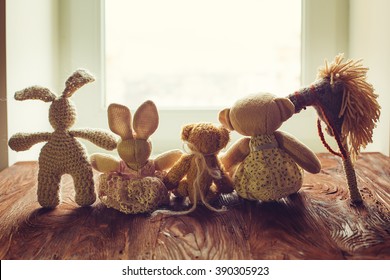 children's toys on wooden floor in front of the window - Powered by Shutterstock