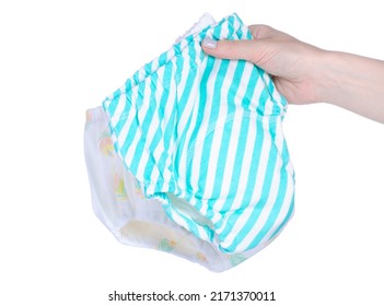 Children's training panties in hand on a white background isolation