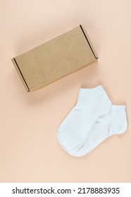Children's White Socks On A Pink Background