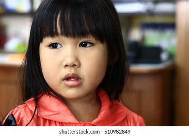 
A child's eyes Asian love. Portrait of a cute Asian child girl and looking aside in-Thailand.