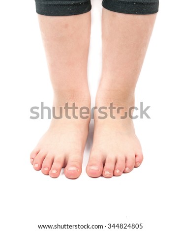 child's feet isolated on white